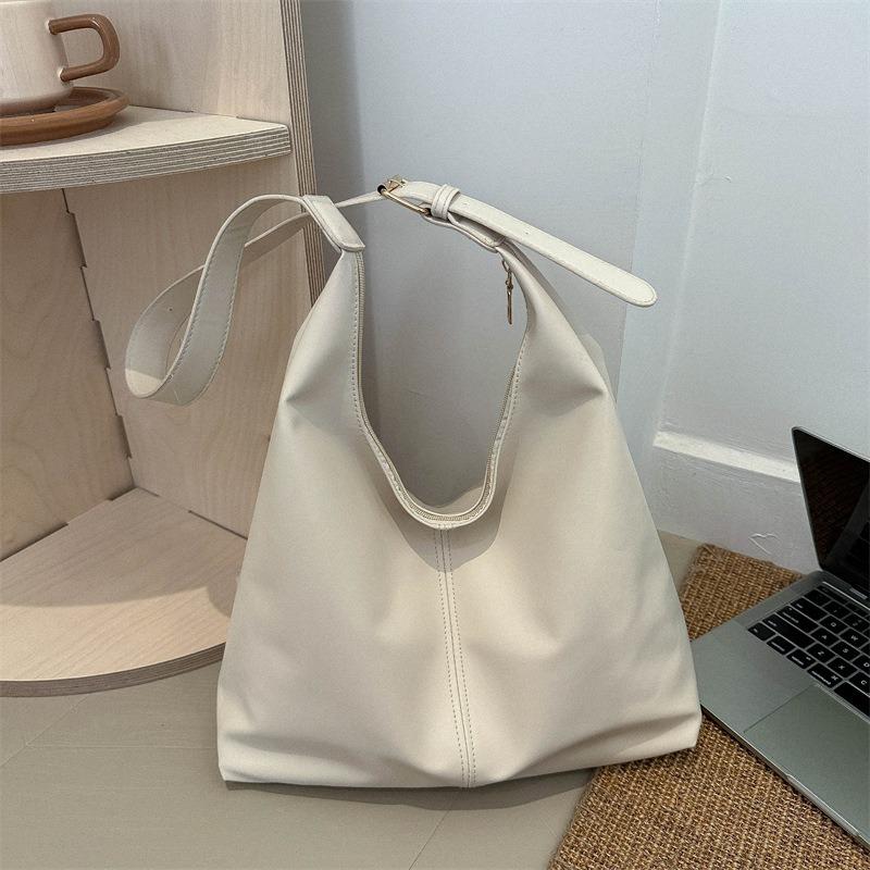 Simple texture solid color retro versatile shoulder bag women's new commuter underarm bag tote bag tide