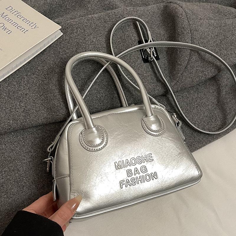 Spring and summer new products niche INS style simple portable pillow bag Korean version commuting versatile fashionable shoulder messenger bag