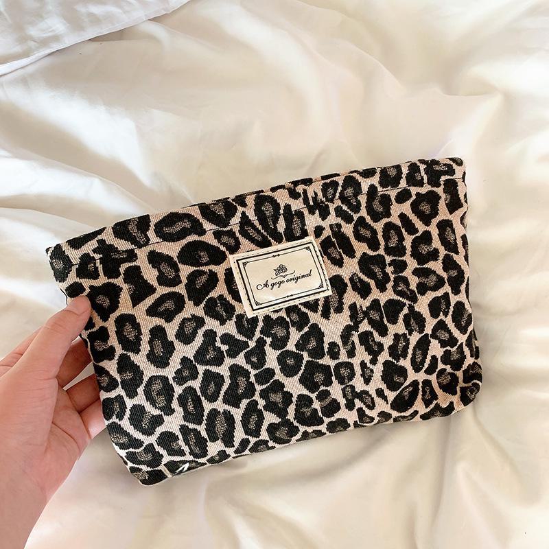 Reise-Kosmetiktasche mit Leopardenmuster und verdicktem Stauraum, praktisches Handdesign für Toilettenartikel