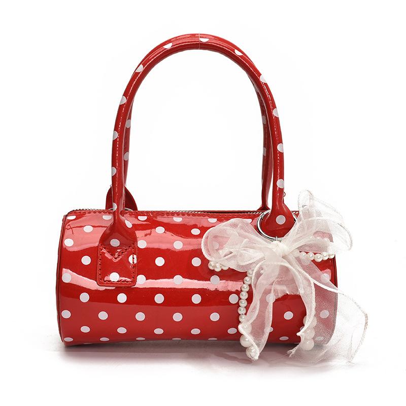 Niche design bag women's 2025 new summer shoulder messenger bag polka dot portable cylinder bag