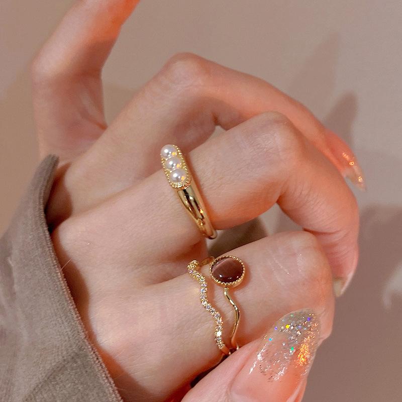 Electroplated Korean artificial opal zir*****pen ring, a sexy index finger ring jewelry.