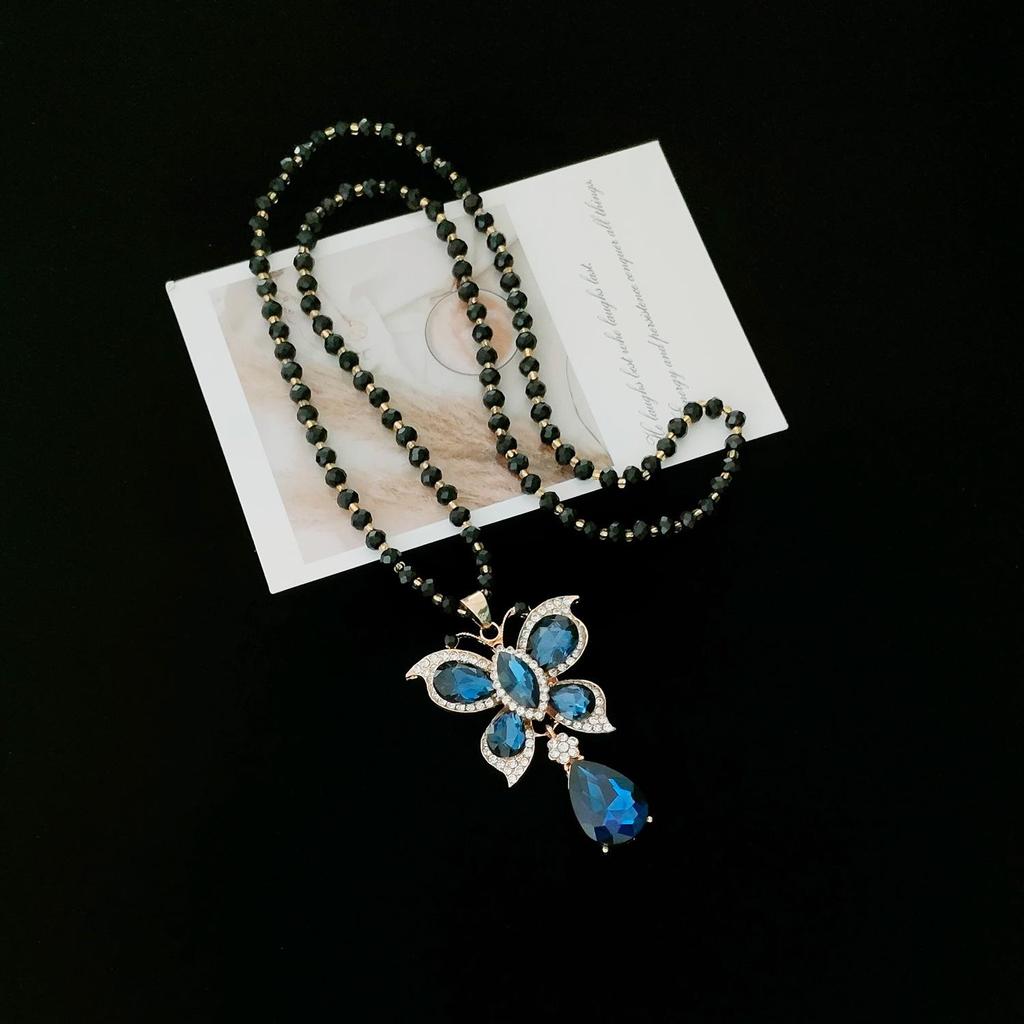 Elegant Rhinestone Cat's Eye Sweater Necklace - Versatile Autumn/Winter Pendant for Women