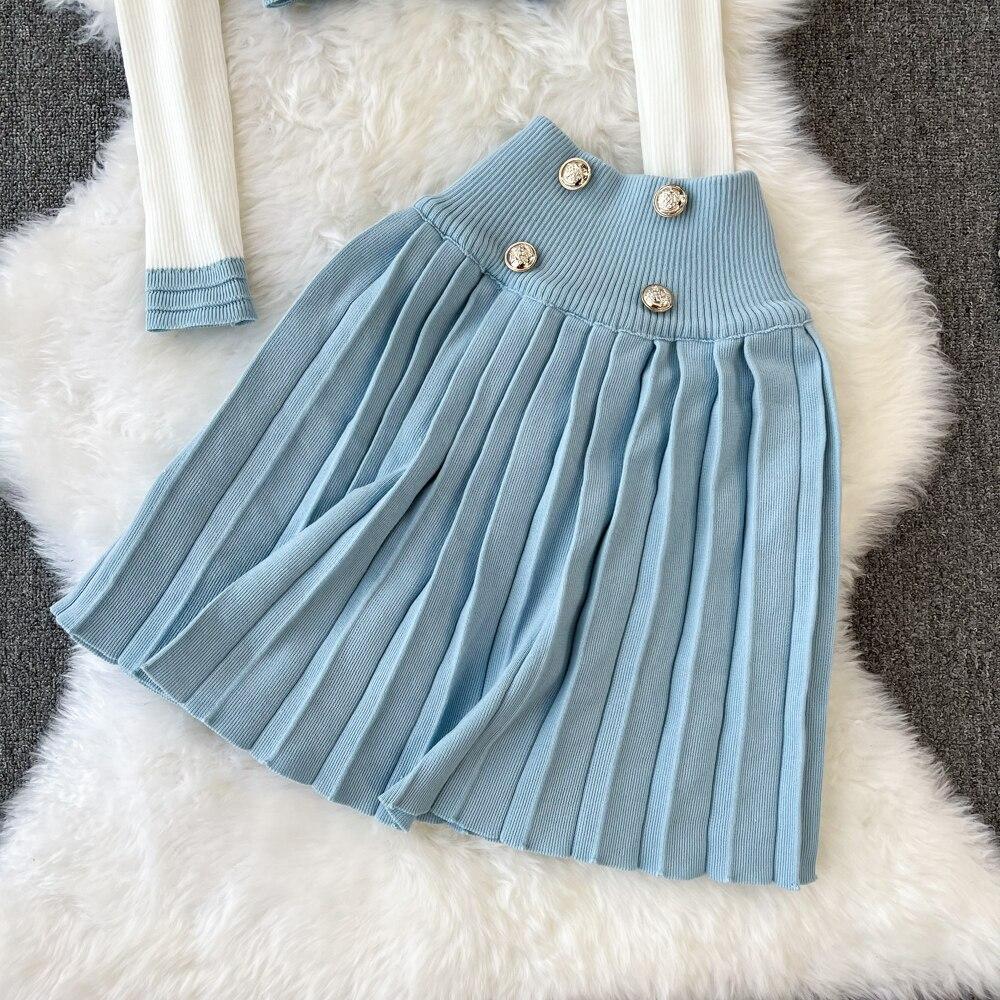 Herbst und Winter V-Ausschnitt Kontrastfarbe Schlanker Strickpullover Oberteil Hohe Taille A-Linie Faltenrock Mode Zweiteiliges Set