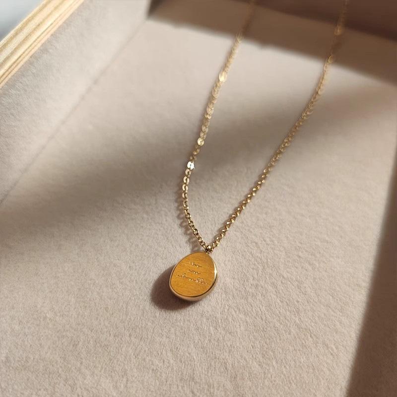 Korean titanium steel letter irregular round brand sweater chain simple temperament pendant collarbone necklace autumn and winter explosion item