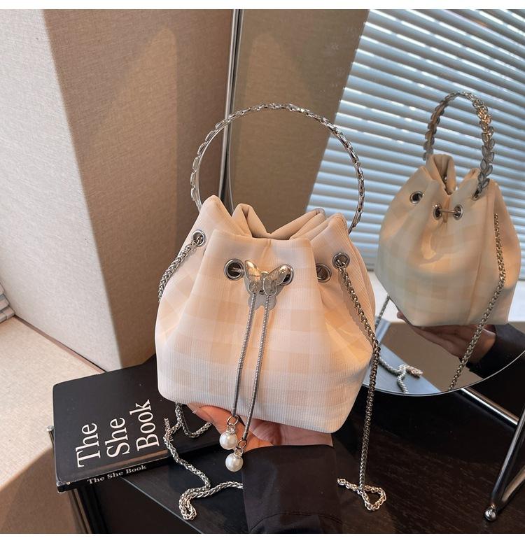 Karomuster Tasche Damen Sommer neue Mode Nische Kette Umhängetasche Kordelzug plissierte Bucket Bag