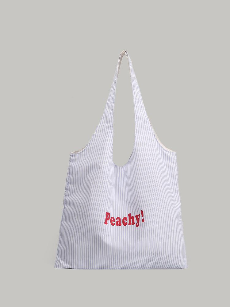 

2025 spring/summer new large-capacity shoulder tote bag Korean striped letter canvas bag is lazy and simple and versatile белый
