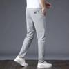 Ice silk casual pants men's 2025 summer new section Korean version slim straight spot wholesale light business trousers