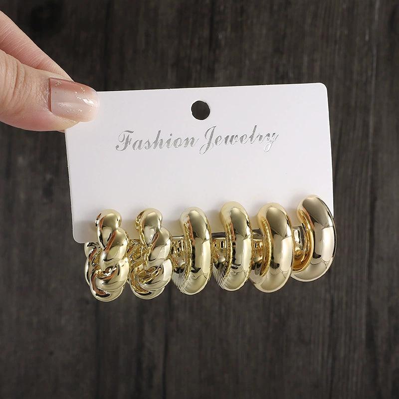 

European and American creative fashion exaggerated sense earrings set women s C-twist water drop earrings set Acrylic