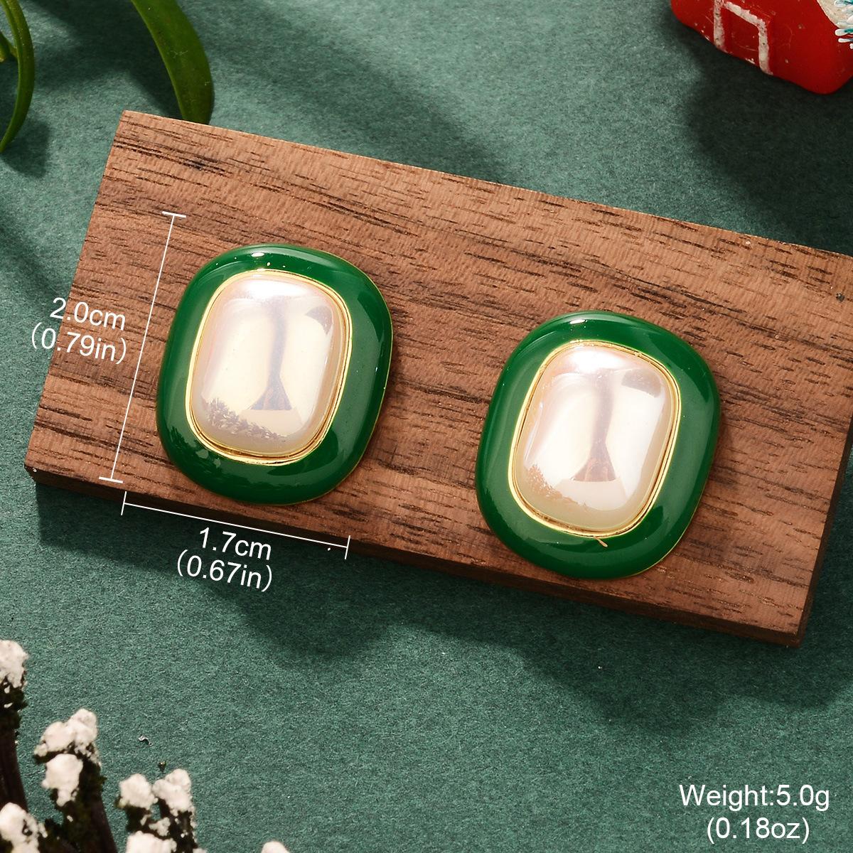 

Light luxury niche green Christmas French premium triangular pearl earrings New trendy silver needle color-preserving stud earrings