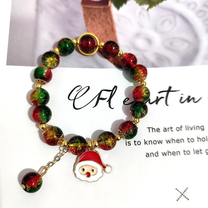 Temu Weihnachtsarmband mit Knisterperlen und Schneeflocken-, Baum-, Weihnachtsmann-, Glockenanhängern