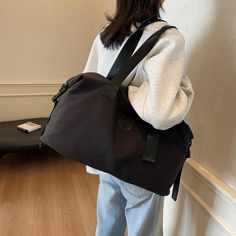 Fashion leisure travel bag, business trip, short trip out, hand bag, daily sports storage, leisure play fitness bag