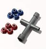 Set of 8 lightweight aluminum wheel nuts (4 blue, 4 red) for Tamiya 101 scale vehicles. Includes plastic flanges. Ideal for weight reduction and