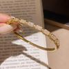 Plaid Gold Bracelet with Shiny Zirconia Ring – Luxurious, Fashionable, and Versatile Ins Style Jewelry.