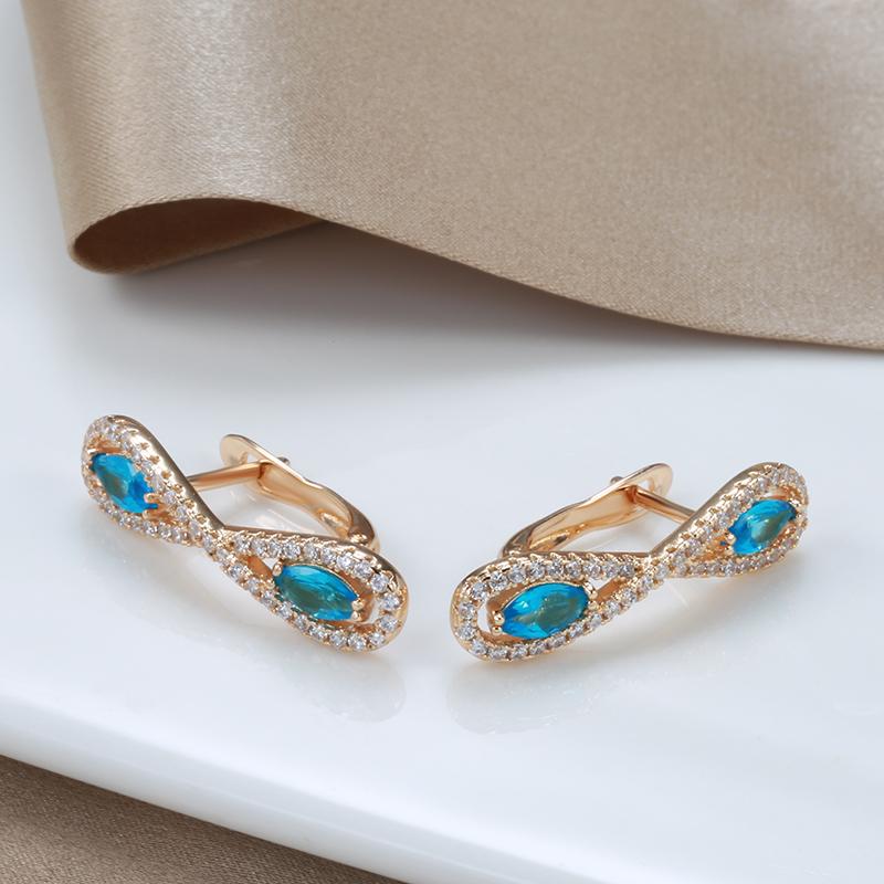 Kinel Blue Zircon Symmetric Rose Gold Color Earrings
