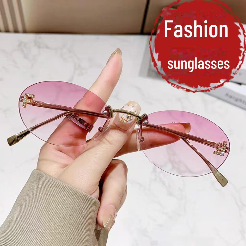 Trendy Oval Frameless Sunglasses with Diamond Accents