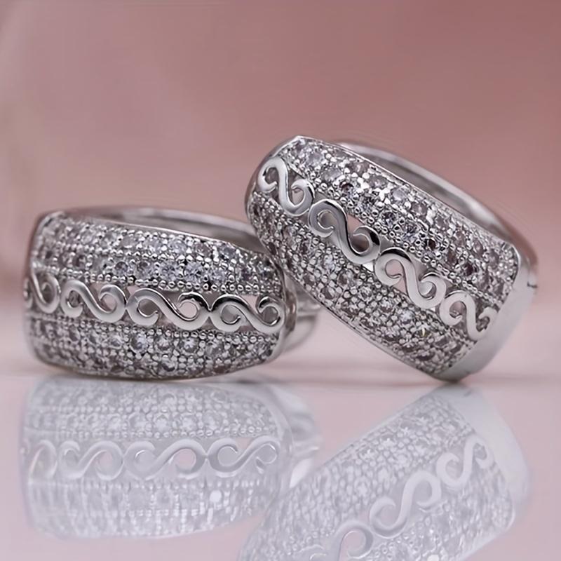A Set of Stylish Earrings for Ladies Featuring an Endless Circular Design, Made with Synthetic Zirconia