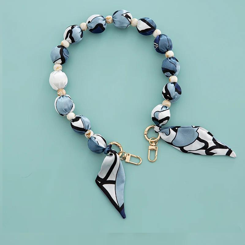 

Vibrant Luxury Handbag and Phone Case Chains with European-American Style and Scarf-Inspired Beaded Designs