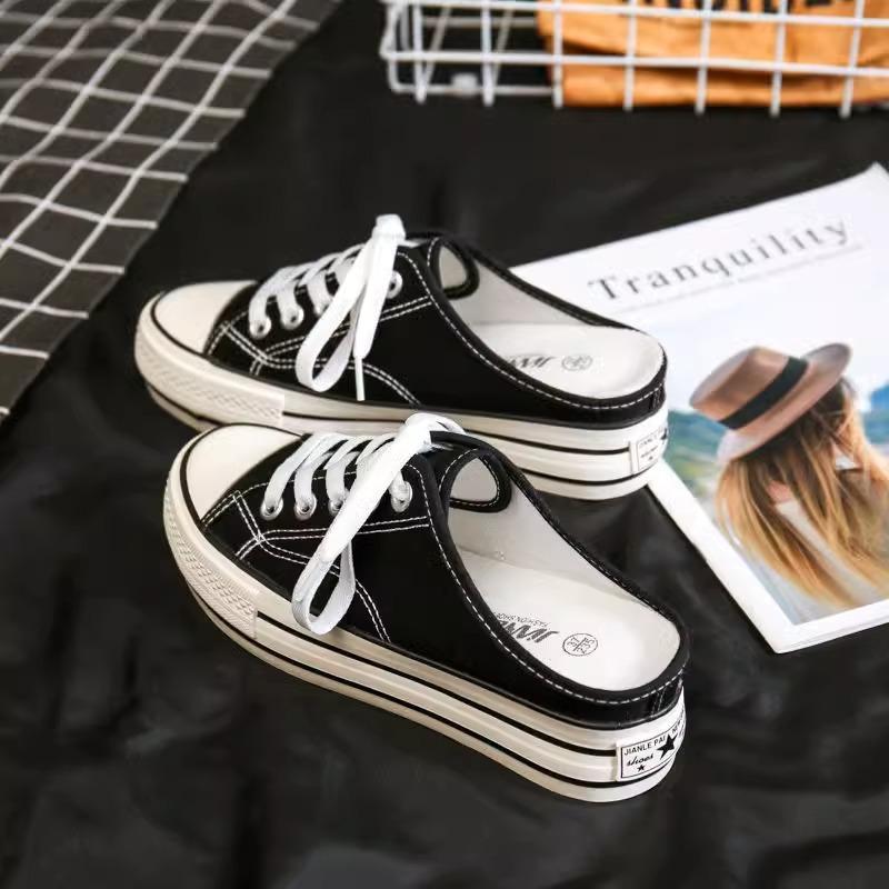 Super fire bag head half slippers women's outer wear 2025 summer new lazy thick-soled white canvas cool slippers sandals