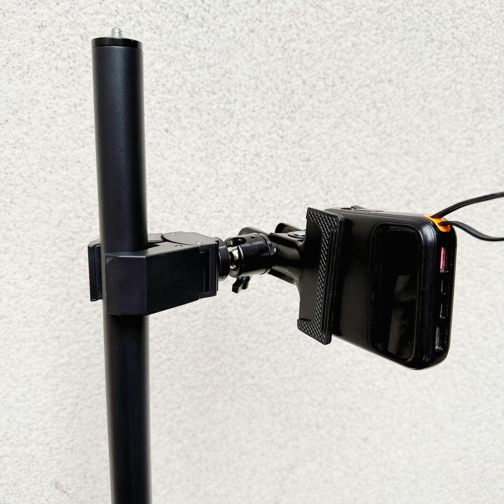 Mobile Streaming Power Bank Holder: 360° Rotation Clip with Metal Ball Head, Tripod Extension, and Strong Clamp.