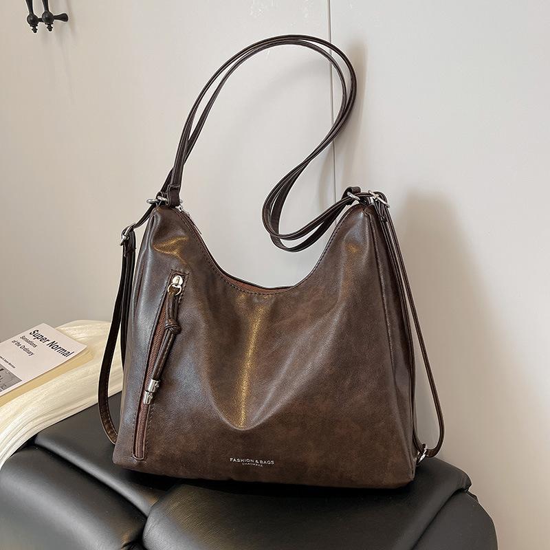 Enkel och rymlig retro tygkasse temperament mode axelväska trendig student avslappnad temperament bärbar budväska