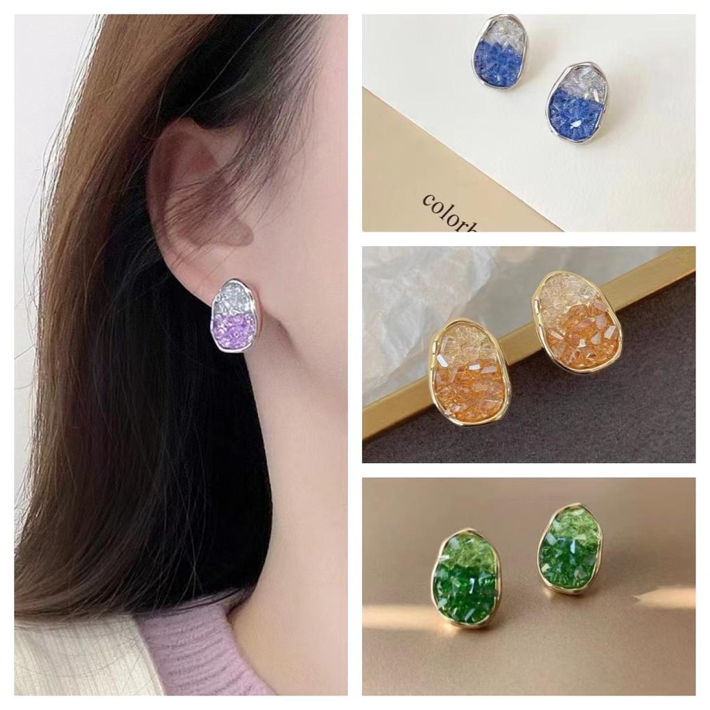Fresh and elegant crystal earrings in orange, sea blue and green pastel gradient colors. Women's light luxury and fashionable earrings.