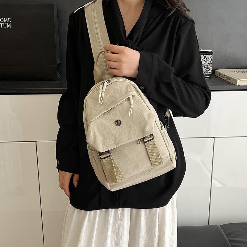 Einfacher Wind große Kapazität Mädchen Rucksack ein Pack vier Rücken Brusttasche Männer vielseitig neuer Mode Rucksack Schulter