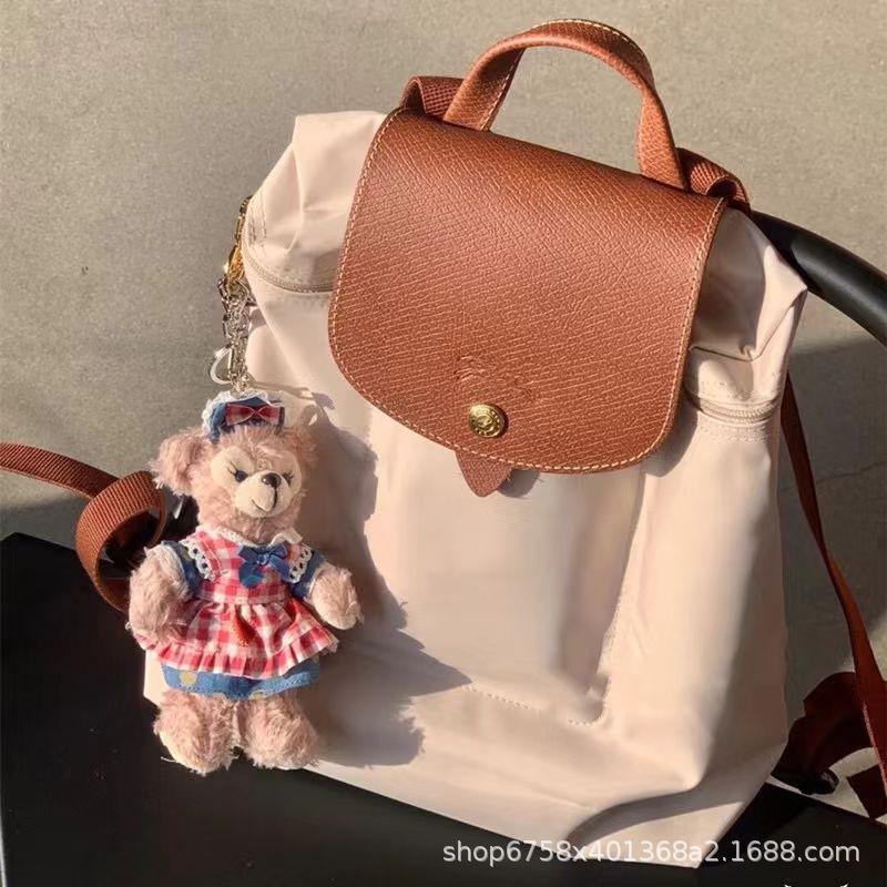 

2025 Классический стиль Женская легкая водонепроницаемая нейлоновая сумка через плечо