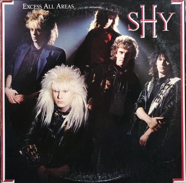 

Вінілова платівка SHY (5) - Excess All Areas 63111RA RCA 1987 США Рок Вживаний