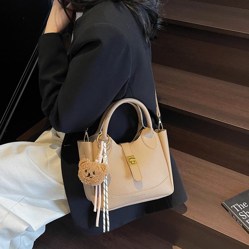 Vysoce módní všestranná taška typu bucket bag dámská 2025 nová taška přes rameno messenger taška vzor liči ruční nošení taška na nákup zeleniny