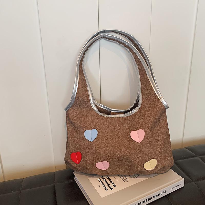 

Korean niche canvas bag women s 2025 summer new trendy casual tote bag sweet girl peach heart armpit bag коричневый