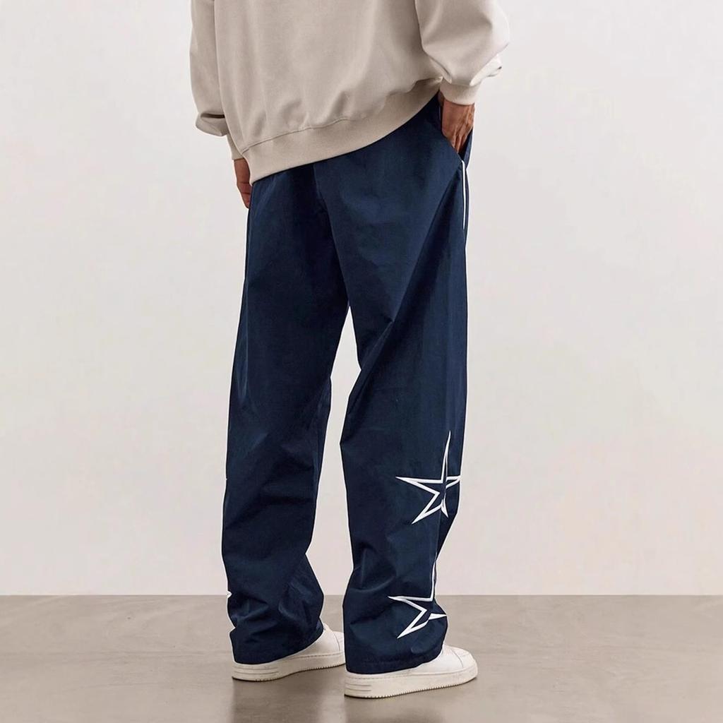 Frühling und Herbst neue Herrenhosen lässige Mode bestickt europäisch und amerikanisch High Street Trend Sportleggings Herren