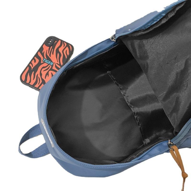 New solid color backpack, junior high school college student schoolbag, leisure travel large-capacity backpack