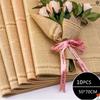 Ambalaj pentru cadouri
 – Hârtie de ambalaj
