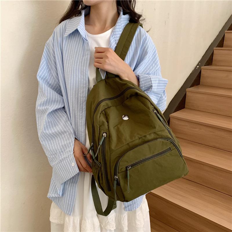 The Backpack Is Lightweight, Casual, and Has A Large Capacity. It Is A Simple and Fashionable Student Schoolbag