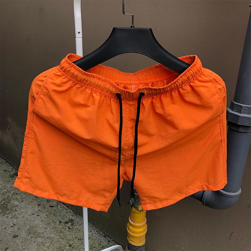 

Мужские быстросохнущие пляжные шорты цвета карамели - модная спортивная одежда свободного кроя XL оранжевый