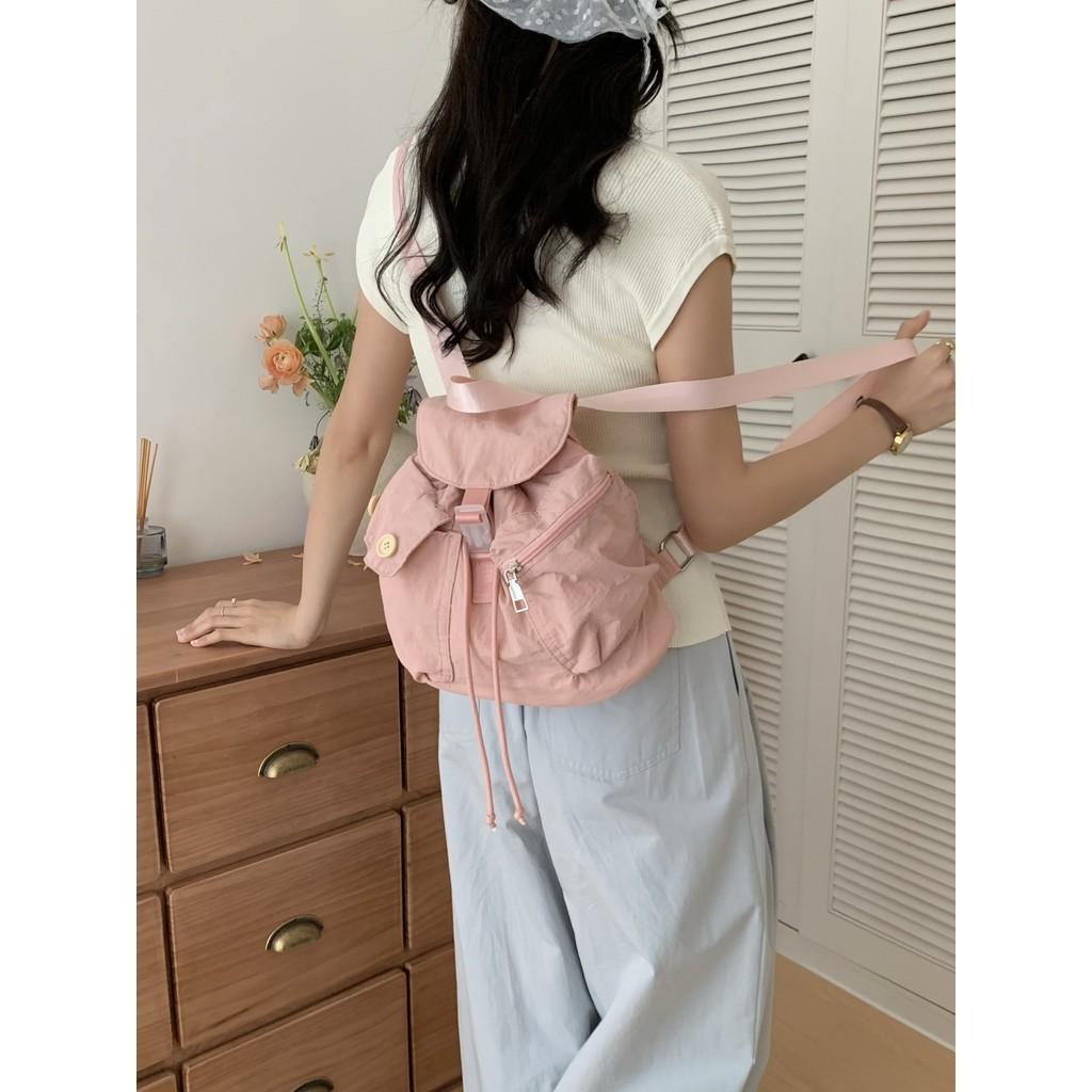 IELGY new Korean niche design outdoor pocket button drawstring double shoulder nylon backpack