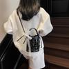 Korean version of niche hand-carried bucket bag women's 2025 spring trendy versatile fashion woven bag foreign-style oblique shoulder bag