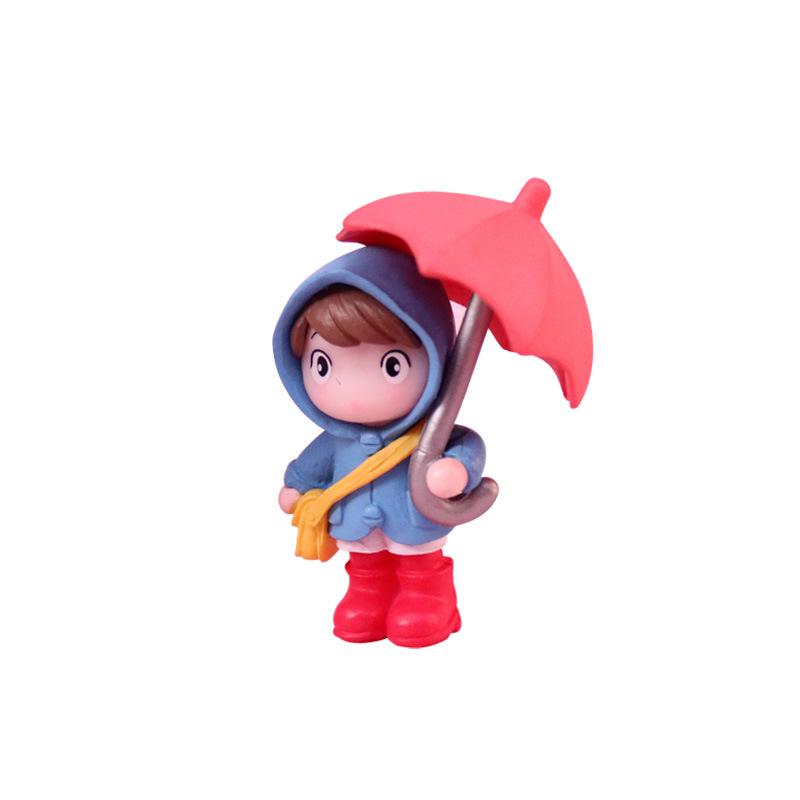 Cartoon Girl Raincoat Figurine: Cute Umbrella-Holding Doll for Desktop or Car Decor