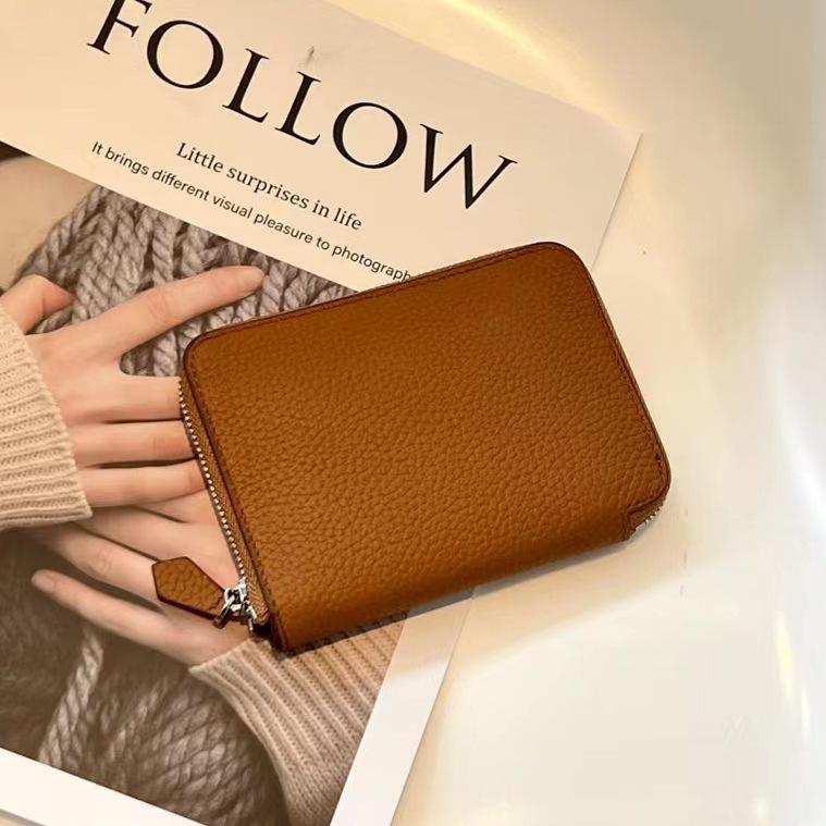 Nouveau petit sac à fermeture éclair en cuir de vachette première couche printemps 2026, portefeuille en cuir véritable, porte-monnaie en cuir souple, production et vente en gros par fabricant de Guangzhou
