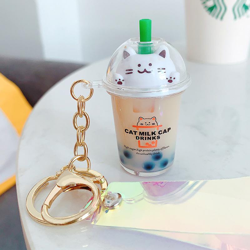 Exquisite Quicksand Pearl Milk Tea Keychain Pendant – Versatile Ornament for Cars, Backpacks, Couples, and More