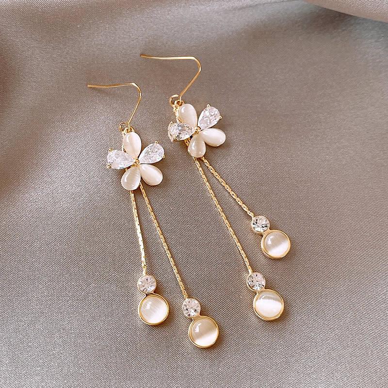 

Серьги-кисточки с бриллиантами в виде цветка, нишевые, в стиле легкой роскоши, высокого класса, с изысканными универсальными темпераментными персонализированными серьгами для женщин