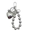 Elegant Hjärta Rosett Nyckelring Modeaccessoar Mångsidig Metallberlock Nyckelring Väskhänge för Nycklar och Ryggsäck