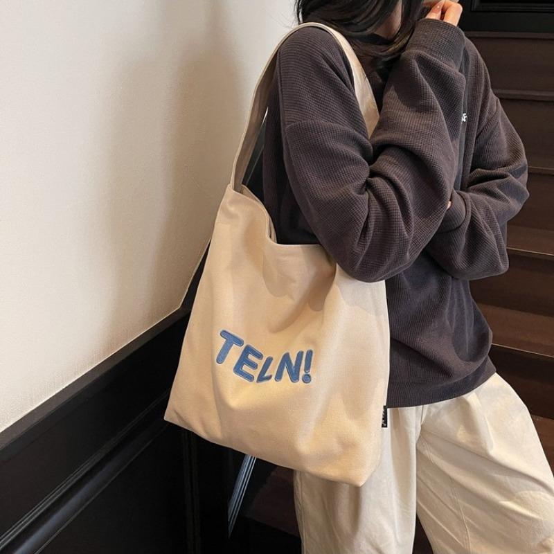 Canvas bag women's large-capacity new summer simple and versatile shoulder messenger bag college student tote bag