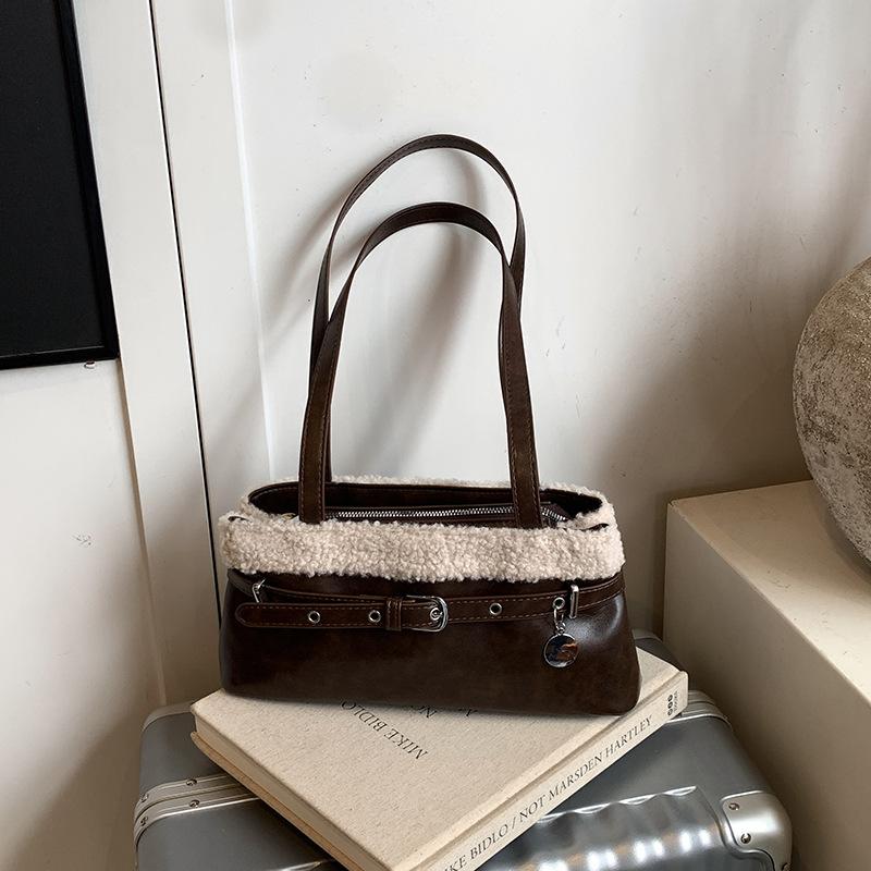 

Korean niche lamb wool splicing shoulder bag women s 2025 autumn and winter new commuter niche baguette armpit bag