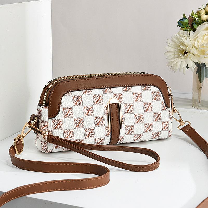 

Корейская версия новой модной универсальной повседневной сумки-мессенджера через плечо с принтом Length 22 Width 5 Height 12cm белый