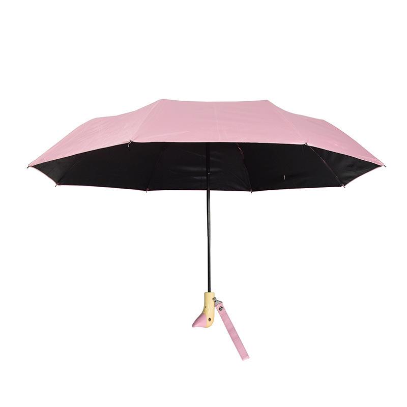 Cute Three-Fold Duck Head Umbrella: Cartoon Design, Wooden Handle, Solid Color for Rain or Shine.