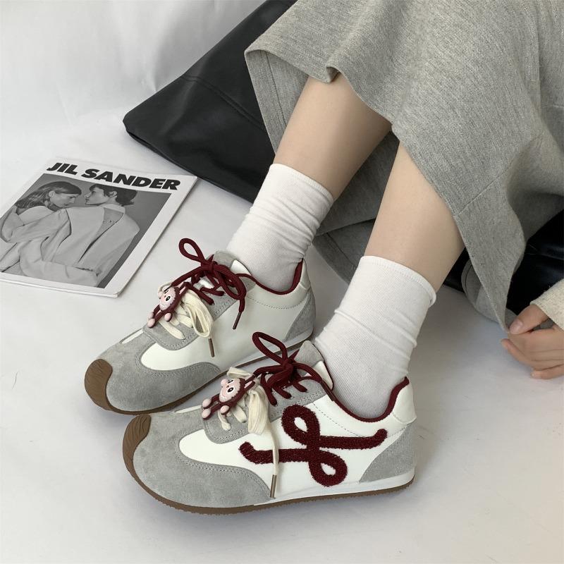 Lightweight women's new spring and autumn leather retro ugly cute tilted head color matching casual