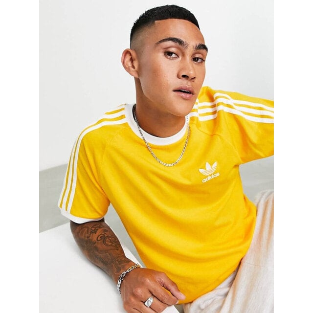 

Золотистая футболка с 3 полосками adidas Originals Adicolor