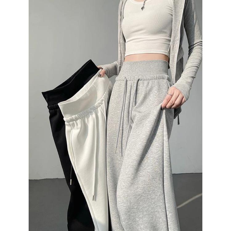 Wygodne i stylowe szare spodnie damskie w amerykańskim stylu ze sznurkiem i szerokimi nogawkami, idealne do noszenia na co dzień i do uprawiania sportu