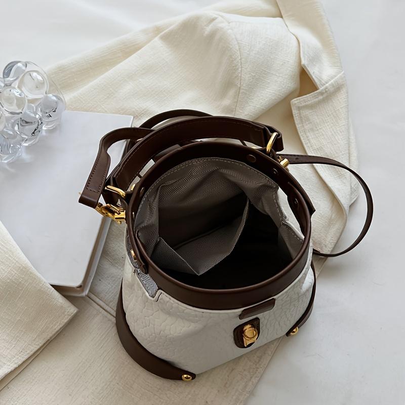 Luxury color-blocked crossbody bag, high-quality feel, stylish Western retro handbag, simple and suitable for commuting, elegant shoulder bag.